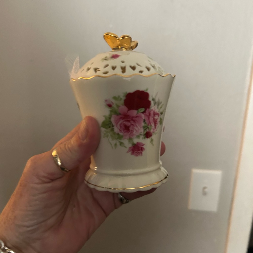 Source Unknown White and Red Ceramic Art Piece
